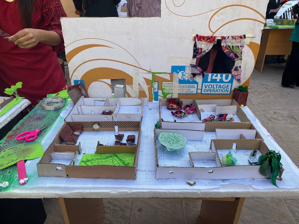 Student-built cardboard house model — a real Quest project at Acton Academy