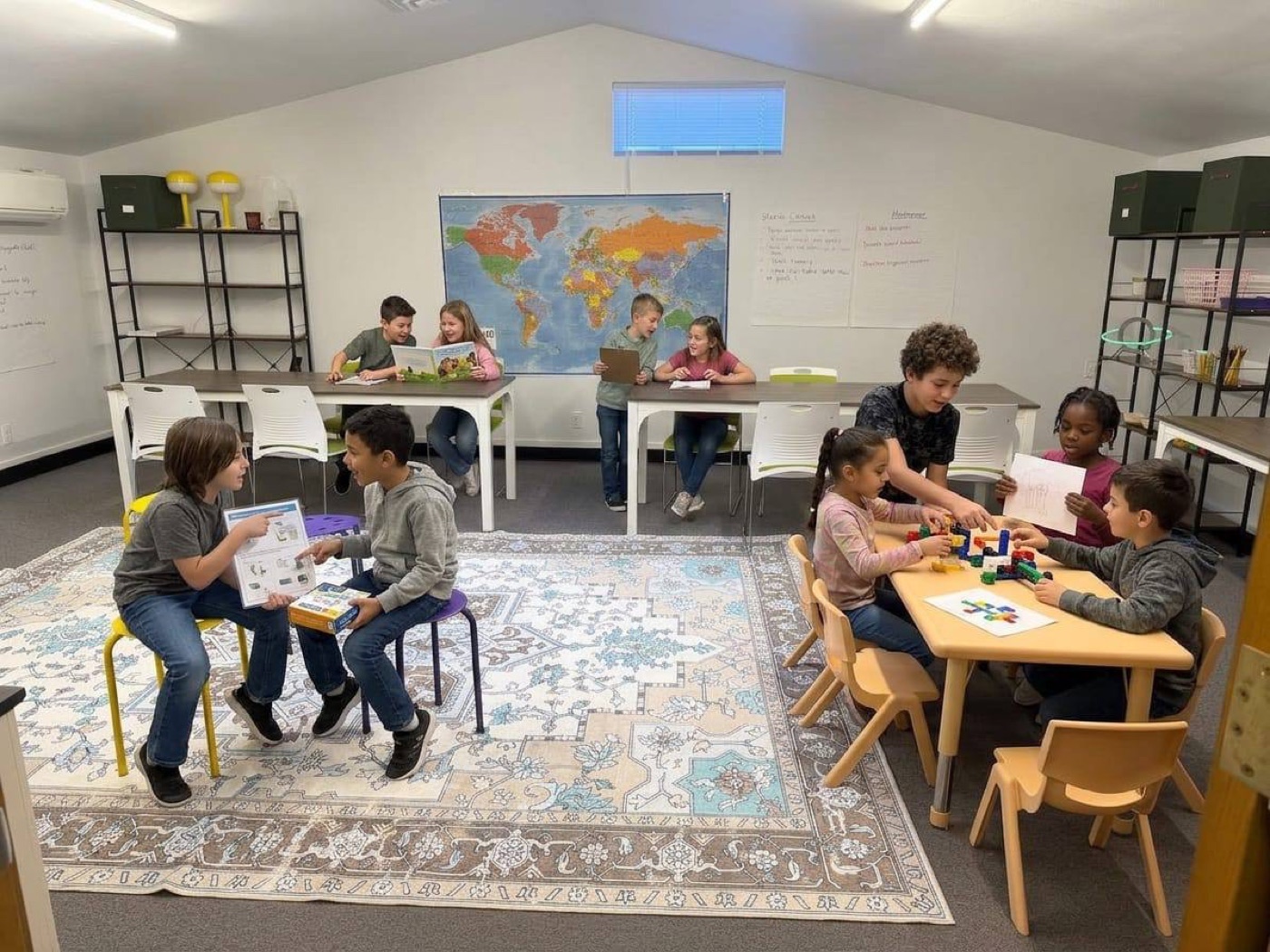 Kids working collaboratively at Acton Academy Ann Arbor