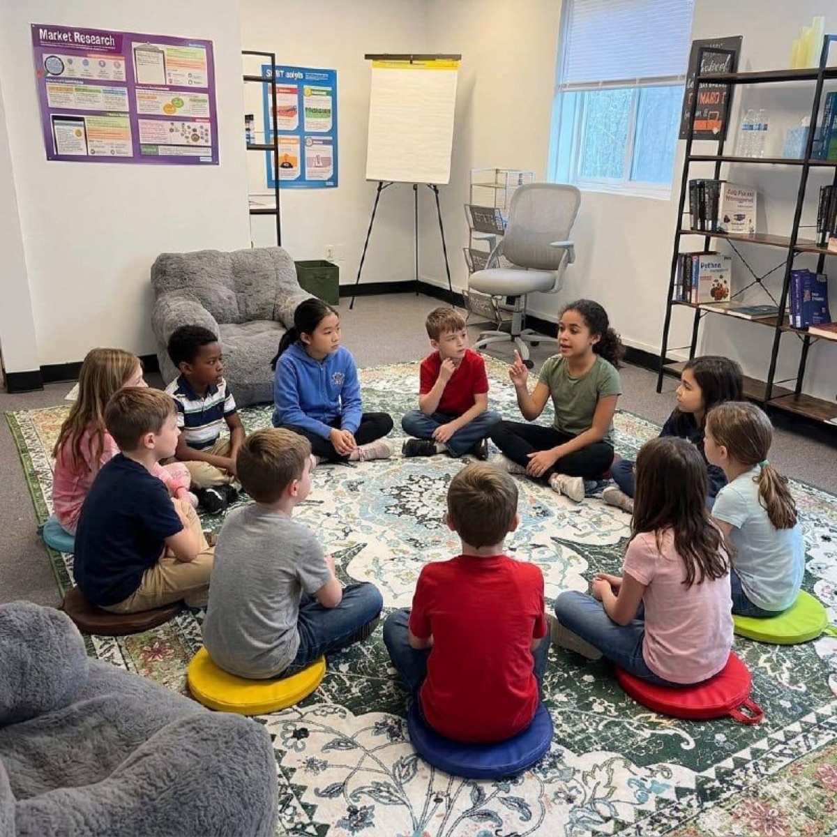 Kids in a Socratic discussion circle at Acton Academy Ann Arbor